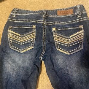 Low rise rock and roll boot cut jeans